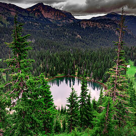 Sunrise Lake On A Cloudy Day by Rick Berk