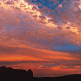 Sunset Over The Moab Rim by Dan Norris