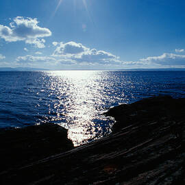 Sunstar Over Yellowstone Lake by Panoramic Images