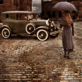 Woman with Umbrella by Vintage Car