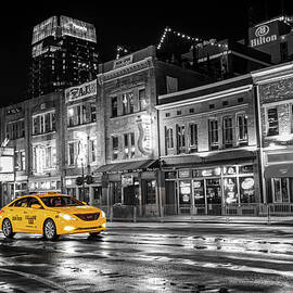 Yellow Taxi Cab on Lower Broadway - Nashville Tennessee by Gregory Ballos