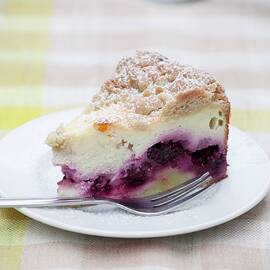 A Slice Of Crumble-topped Quark Cake With Blackberries by Food Experts Group