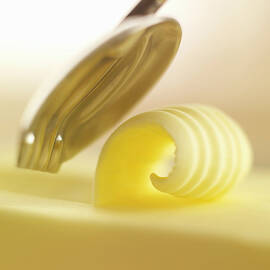 Close Up Of Butter Curl by Adam Gault