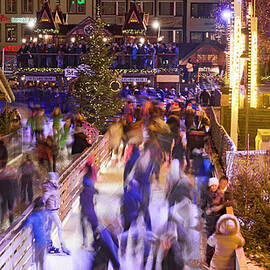 Ice Skating Ring At Christmas Market In Cologne by Cavan Images