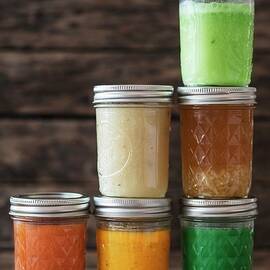 Various Soups In Screw-top Jars by Jan Wischnewski