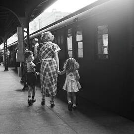 Walking To The Subway by Rae Russel