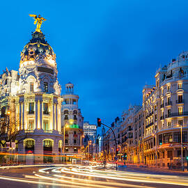 Car And Traffic Lights On Gran Via by Prasit Rodphan