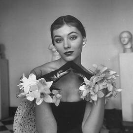 Model in flowery dress by Nina Leen