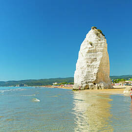 Italy, Apulia, Foggia District, Mediterranean Sea, Adriatic Sea, Adriatic Coast, Gargano National Park, Gargano, Vieste, View Of The Beach And Pizzomunno Rock, Famous Stack Symbol Of The City Of Vieste by Marco Arduino