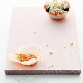 A Blackberry Muffin And The Empty Paper Case From An Eaten Muffin by Michael Wissing