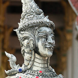 A Kinnara Statue, Wat Chang Kam Phra Wihan, Wiang Kum Kam, Chian by Derrick Neill