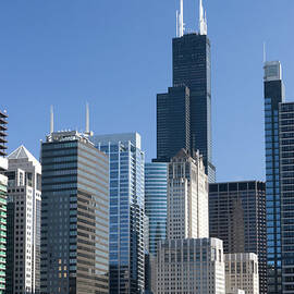 A View Of The Many Tall Buildings In by Christopherarndt
