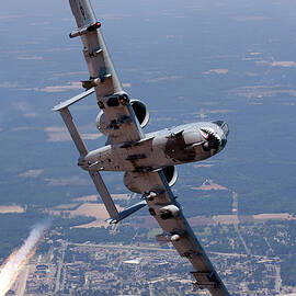 An A-10c Warthog Popping Flares While by Erik Roelofs