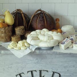 Assorted Cheeses, Italy by Enrico Martino
