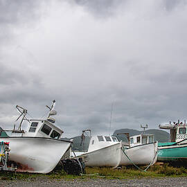 Boats On A Beach by Andrew Wilson