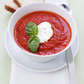 Bowl Of Soup With Herbs And Cheese by Brigitte Sporrer