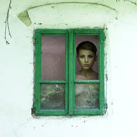 By The Window by Marius Cintez?