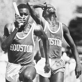 Carl Lewis Running Relay With Greg by Bettmann