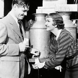 CLARK GABLE and CLAUDETTE COLBERT in IT HAPPENED ONE NIGHT -1934-. by Album