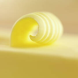 Close Up Of Butter Curl by Adam Gault