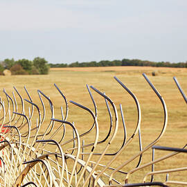 Close Up Of Thresher In Crop Field by Matt Hoover Photo