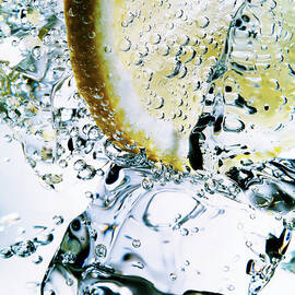 Drink With Ice And Lemon, Close Up by Jonathan Knowles
