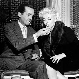 Edward R. Murrow Lights Cigarette For by Cbs Photo Archive