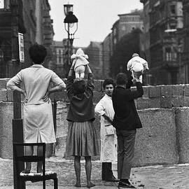 Father And Mother Showing Baby by Bettmann