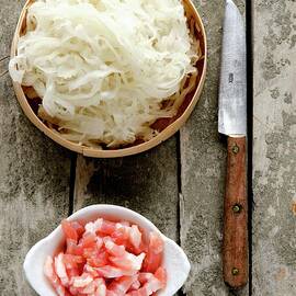 Fresh Sauerkraut From Alsace In A Wooden Dish, Lardons Of Bacon And A Rustic Knife by Jamie Watson