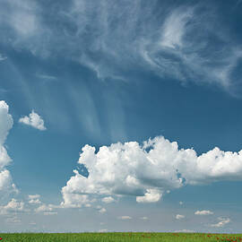 Germany, Cumulus Clouds Over Rape Field by Westend61