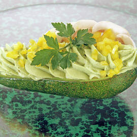 Halved Avocado Topped With Mushrooms, Peppers And Avocado Cream by Jalag / Uwe Bender