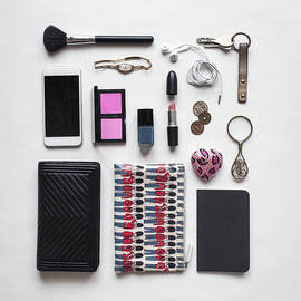 High Angle View Of Accessories Arranged On White Background by Cavan Images