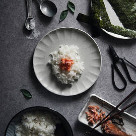 High Angle View Of Rice With Fish And Nori Served On Table by Cavan Images