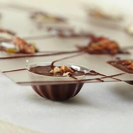 Homemade Chocolates In Molds; Some With Nuts And Some With Bacon by James, Bruce