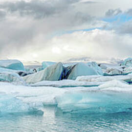 Iceberg Glacier Lagoon In Iceland by Sjo