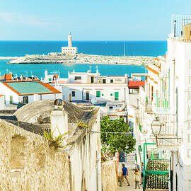 Italy, Apulia, Foggia District, Mediterranean Sea, Adriatic Sea, Adriatic Coast, Gargano, Vieste, View Of The Lighthouse Of Vieste From Old Town. by Marco Arduino