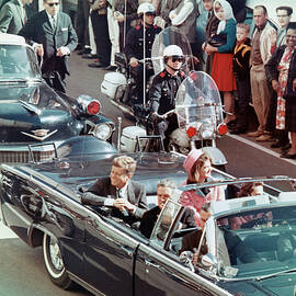 Kennedys Riding In Dallas Motorcade by Bettmann