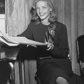 Lauren Bacall Studies Script by Cbs Photo Archive