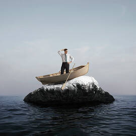 Man In Boat Stuck On A Rock by Stephen Swintek