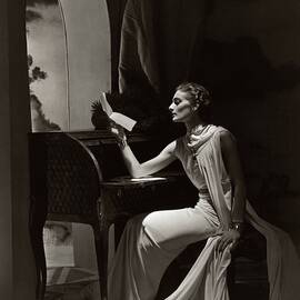 Model Reading At A Roll-top Desk by Horst P Horst