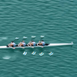 Quadruple Scull Rowing Team Practicing by Technotr