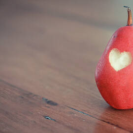 Red Pear With Heart Shape Bit by Danielle Donders