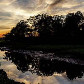 Reflective Sunset by Sean Sweeney