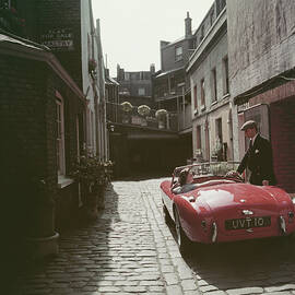 Sports Car Couple by Slim Aarons