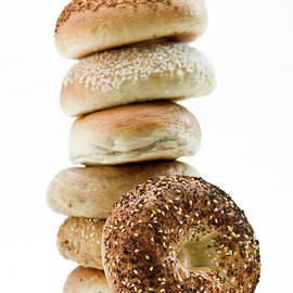 Stack Of Assorted Bagels by Juanmonino