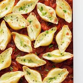 Stuffed Pasta Shells With Tomato Sauce view From Above by Michael Wissing