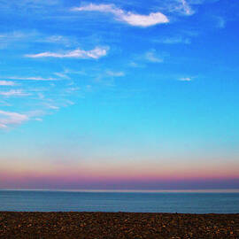 Sunset On Empty Beach With Lifebouy On by Image By Catherine Macbride