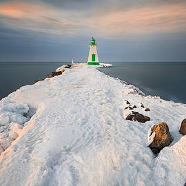The Lighthouse In A Winter Sunset by Li Jian
