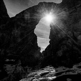 The Sun Peeking Through Arch by S Katz