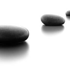 Three Pebble Stones In A Row by Fpm